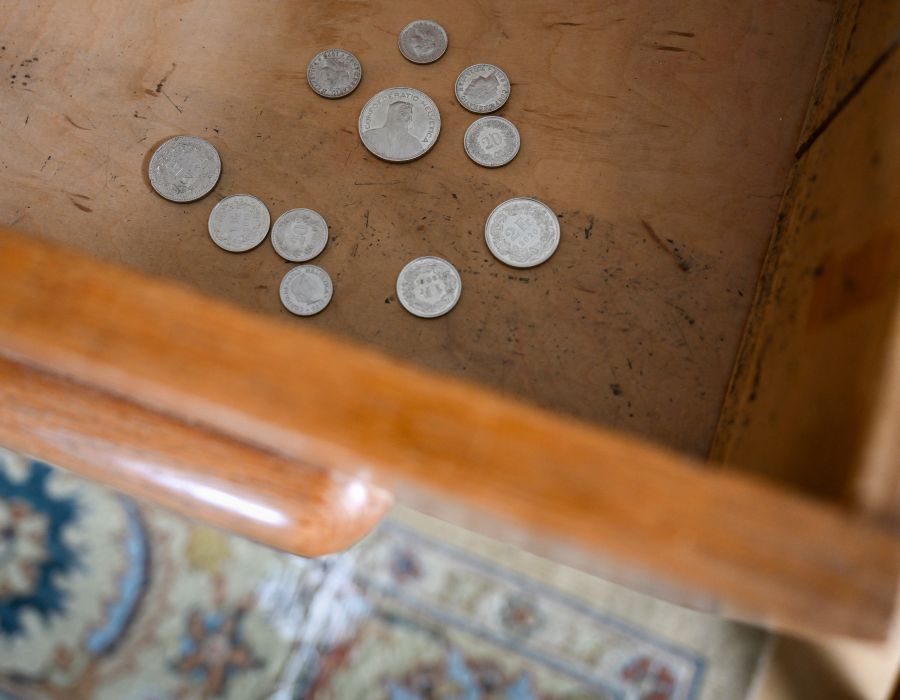 Pièces de monnaie dans un tiroir.